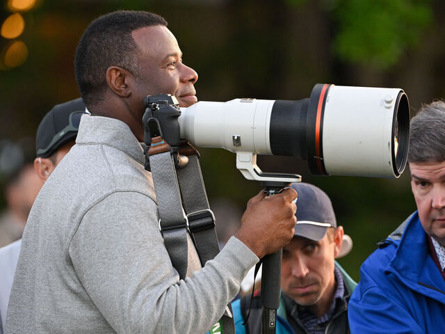 AUGUSTA, GEORGIA - APRIL 10: Ken Griffey Jr., american baseball player, stands with a camera near the first tee box during the first round of Masters Tournament at Augusta National Golf Club on April 10, 2025 in Augusta, Georgia.