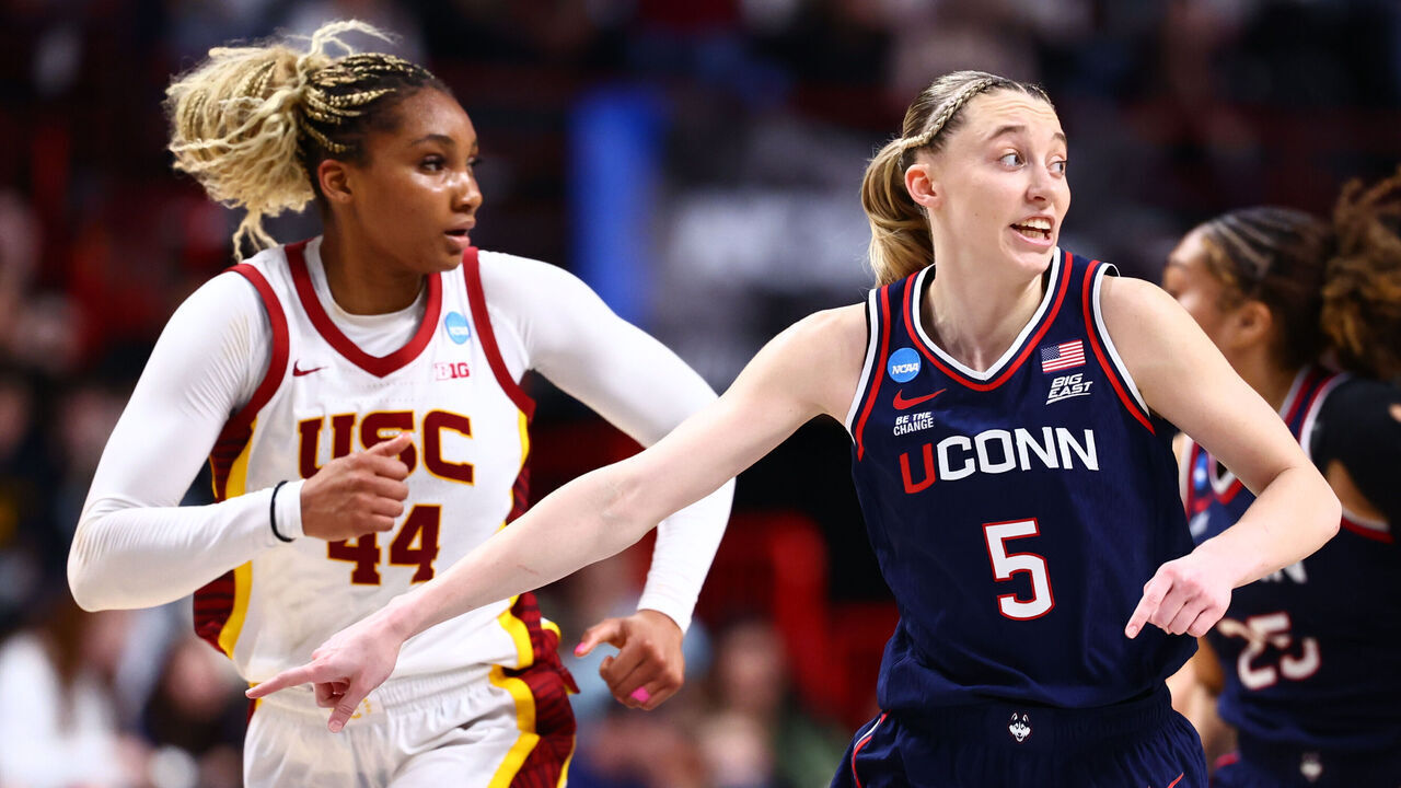 SPOKANE, WASHINGTON - MARCH 31: Paige Bueckers #5 of the UConn Huskies runs up court in a game against the USC Trojans during the Elite Eight round of the 2025 NCAA Women's Basketball Tournament held at Spokane Arena on March 31, 2025 in Spokane, Washington.