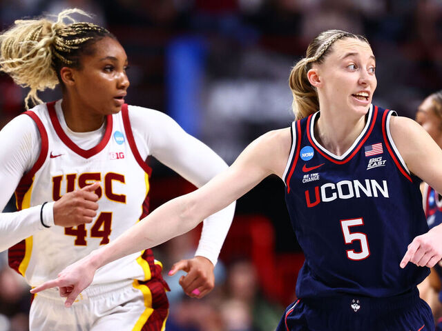 SPOKANE, WASHINGTON - MARCH 31: Paige Bueckers #5 of the UConn Huskies runs up court in a game against the USC Trojans during the Elite Eight round of the 2025 NCAA Women's Basketball Tournament held at Spokane Arena on March 31, 2025 in Spokane, Washington.