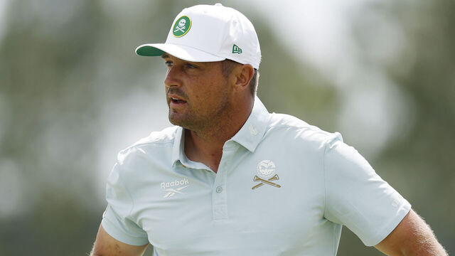 AUGUSTA, GEORGIA - APRIL 11: Bryson DeChambeau of the United States reacts after putting for par on the 18th hole during the second round of the 2025 Masters Tournament at Augusta National Golf Club on April 11, 2025 in Augusta, Georgia.