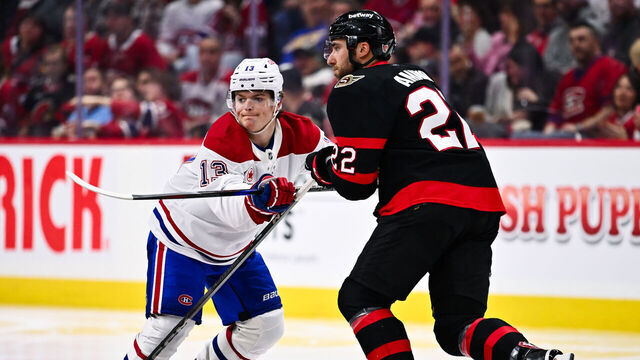 OTTAWA, CANADA - APRIL 11: Cole Caufield #13 of the Montreal Canadiens holds back Michael Amadio #22 of the Ottawa Senators during the third period at Canadian Tire Centre on April 11, 2025 in Ottawa, Ontario, Canada. The Ottawa Senators defeated the Montreal Canadiens 5-2.