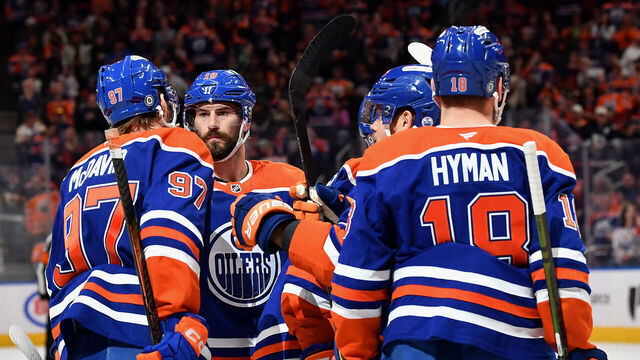 EDMONTON, CANADA - APRIL 11: Evan Bouchard #2, Viktor Arvidsson #33, Adam Henrique #19, Zach Hyman #18 and Connor McDavid #97 of the Edmonton Oilers celebrate a first-period goal against the San Jose Sharks during the game at Rogers Place on April 11, 2025, in Edmonton, Alberta, Canada.