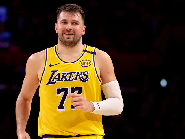 LOS ANGELES, CALIFORNIA - APRIL 11: Luka Doncic #77 of the Los Angeles Lakers reacts after a basket during the second quarter against the Houston Rockets at Crypto.com Arena on April 11, 2025 in Los Angeles, California.