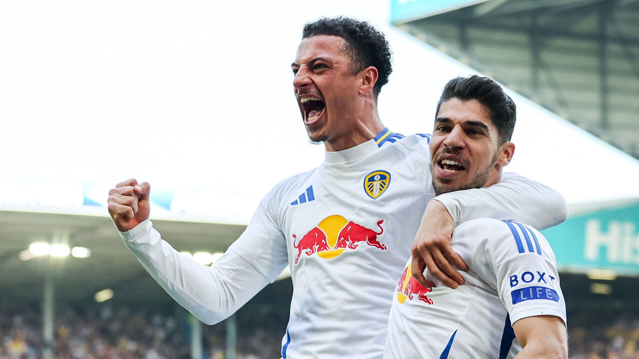 LEEDS, ENGLAND - APRIL 12: Leeds United's Manor Solomon celebrates scoring the opening goal with Ethan Ampadu during the Sky Bet Championship match between Leeds United FC and Preston North End FC at Elland Road on April 12, 2025 in Leeds, England.