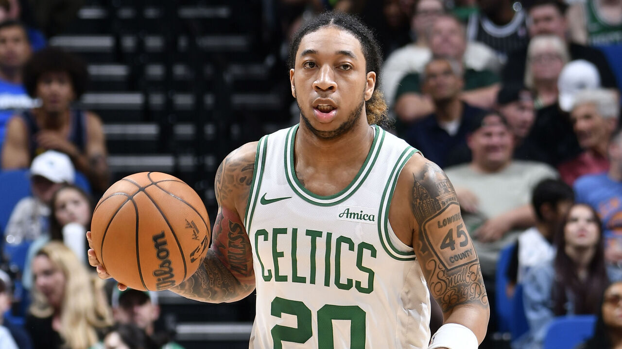 ORLANDO, FL - APRIL 9: JD Davison #20 of the Boston Celtics handles the ball during the game against the Orlando Magic JD Davidson on April 9, 2025 at Kia Center in Orlando, Florida. Mandatory Copyright Notice: Copyright 2025 NBAE