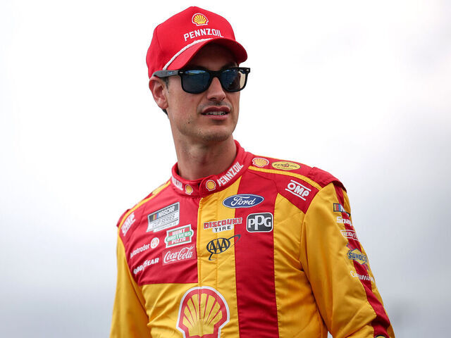 DARLINGTON, SOUTH CAROLINA - APRIL 06: Joey Logano, driver of the #22 Shell Pennzoil Ford, walks the grid prior to the NASCAR Cup Series Goodyear 400 at Darlington Raceway on April 06, 2025 in Darlington, South Carolina.