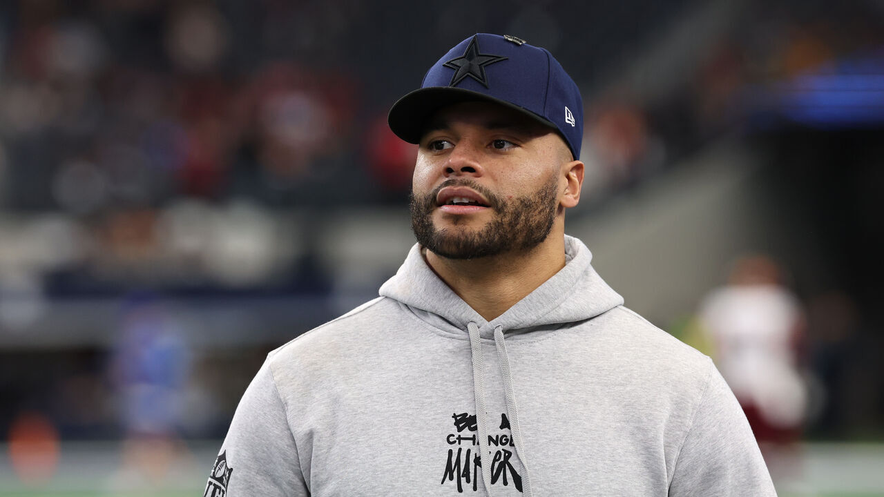 ARLINGTON, TEXAS - JANUARY 05: Dak Prescott #4 of the Dallas Cowboys looks on prior to the game against the Washington Commanders at AT&T Stadium on January 05, 2025 in Arlington, Texas.