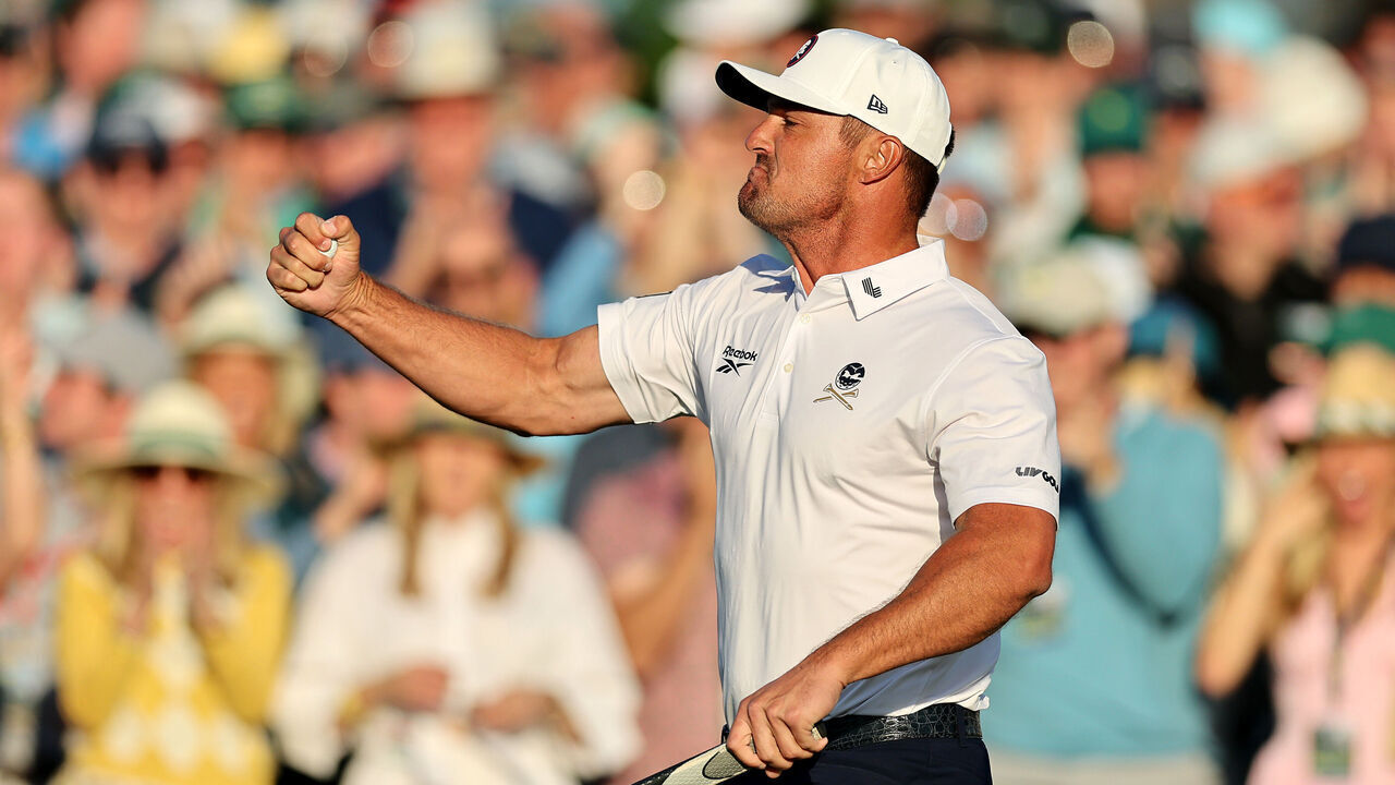 AUGUSTA, GEORGIA - APRIL 12: Bryson DeChambeau of the United States reacts on the 18th green during the third round of the 2025 Masters Tournament at Augusta National Golf Club on April 12, 2025 in Augusta, Georgia.