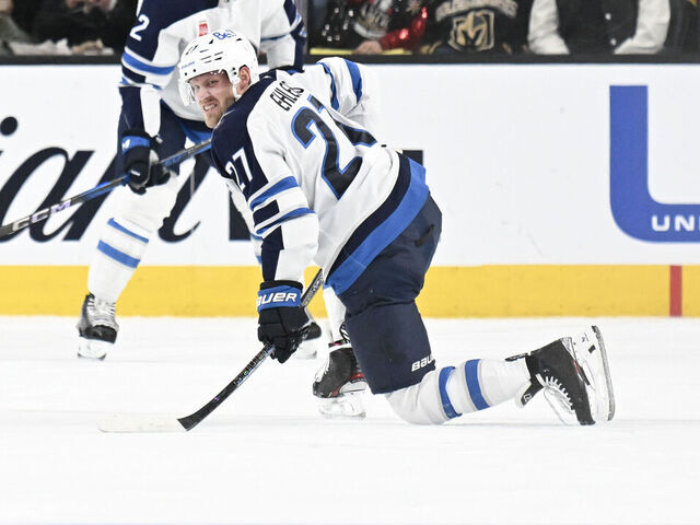 LAS VEGAS, NEVADA - APRIL 03: Nikolaj Ehlers #27 of the Winnipeg Jets kneels on the ice after blocking a shot against the Vegas Golden Knights in the first period of their game at T-Mobile Arena on April 03, 2025 in Las Vegas, Nevada. The Jets defeated the Golden Knights 4-0.