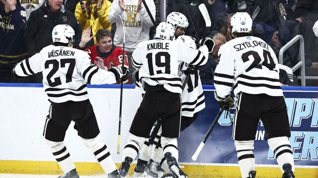 ST LOUIS, MISSOURI - APRIL 12: The Western Michigan Broncos celebrate after a goal against the Boston University Terriers in the second period during the Division I Men's Ice Hockey Championship held at the Enterprise Center on April 12, 2025 in St Louis, Missouri.