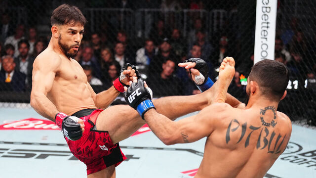 MIAMI, FLORIDA - APRIL 12: (L-R) Yair Rodriguez of Mexico kicks Patricio 'Pitbull' Freire of Brazil in a featherweight bout during the UFC 314 event at Kaseya Center on April 12, 2025 in Miami, Florida.