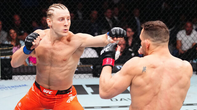 MIAMI, FLORIDA - APRIL 12: (L-R) Paddy Pimblett of England punches Michael Chandler in a lightweight bout during the UFC 314 event at Kaseya Center on April 12, 2025 in Miami, Florida.