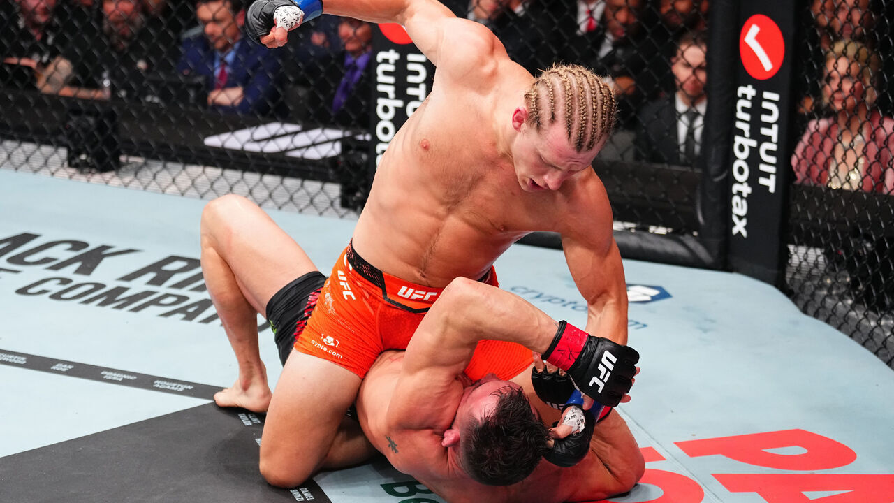 MIAMI, FLORIDA - APRIL 12: Paddy Pimblett of England punches Michael Chandler in a lightweight bout during the UFC 314 event at Kaseya Center on April 12, 2025 in Miami, Florida.
