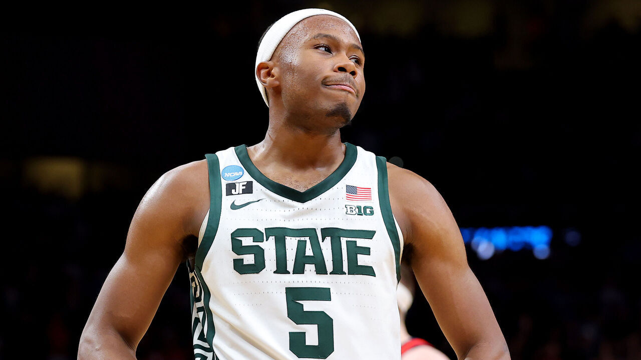 ATLANTA, GEORGIA - MARCH 28: Tre Holloman #5 of the Michigan State Spartans celebrates after defeating the Ole Miss Rebels 73-70 during the second half in the South Regional Sweet Sixteen round of the NCAA Men's Basketball Tournament at State Farm Arena on March 28, 2025 in Atlanta, Georgia.