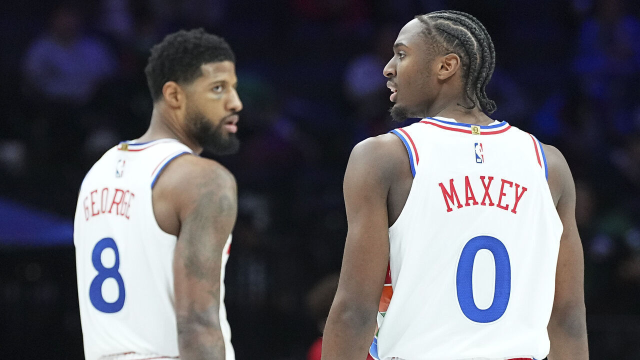 PHILADELPHIA, PENNSYLVANIA - FEBRUARY 11: Tyrese Maxey #0 and Paul George #8 of the Philadelphia 76ers look on against the Toronto Raptors at the Wells Fargo Center on February 11, 2025 in Philadelphia, Pennsylvania. The Raptors defeated the 76ers 106-103. NOTE TO USER: User expressly acknowledges and agrees that, by downloading and/or using this photograph, user is consenting to the terms and conditions of the Getty Images License Agreement.