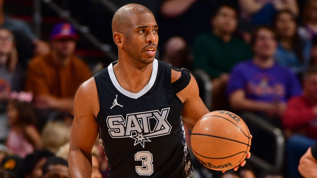 PHOENIX, AZ - APRIL 11: Chris Paul #3 of the San Antonio Spurs dribbles the ball during the game against the Phoenix Suns on April 11, 2025 at PHX Arena in Phoenix, Arizona. Mandatory Copyright Notice: Copyright 2025 NBAE