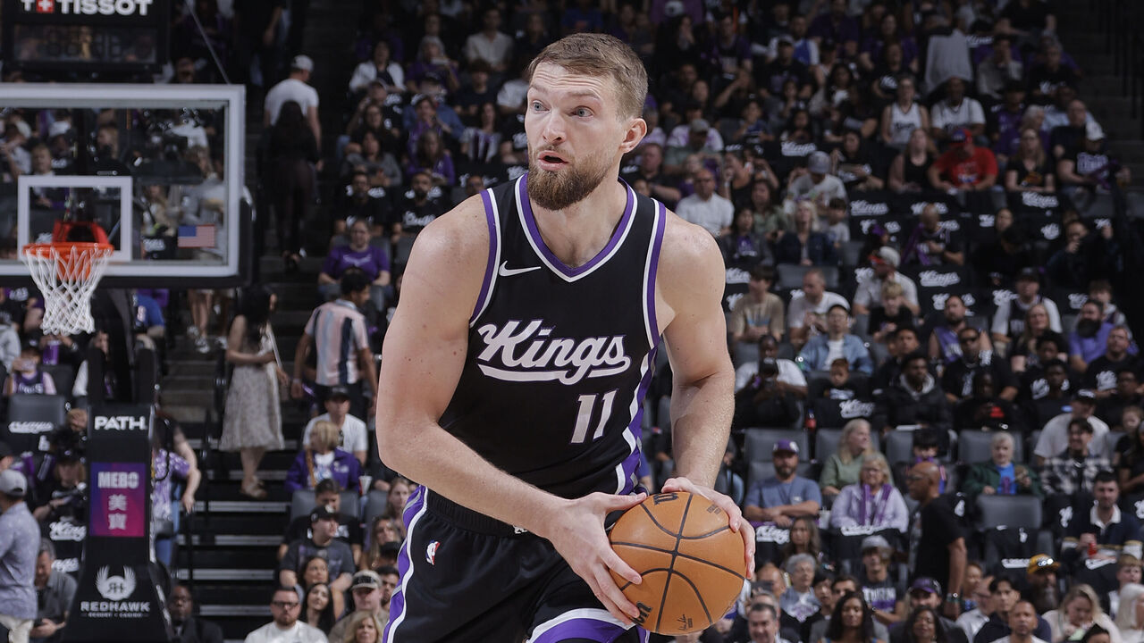 SACRAMENTO, CA - APRIL 13: Domantas Sabonis #11 of the Sacramento Kings handles the ball during the game against the Phoenix Suns on April 13, 2025 at Golden 1 Center in Sacramento, California. Mandatory Copyright Notice: Copyright 2025 NBAE