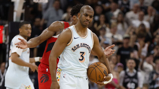 SAN ANTONIO, TX - APRIL 13: Chris Paul #3 of the San Antonio Spurs stares down Scottie Barnes #4 of the Toronto Raptors after he was fouled in the second half at Frost Bank Center on April 13, 2025 in San Antonio, Texas. NOTE TO USER: User expressly acknowledges and agrees that, by downloading and or using this photograph, User is consenting to terms and conditions of the Getty Images License Agreement.