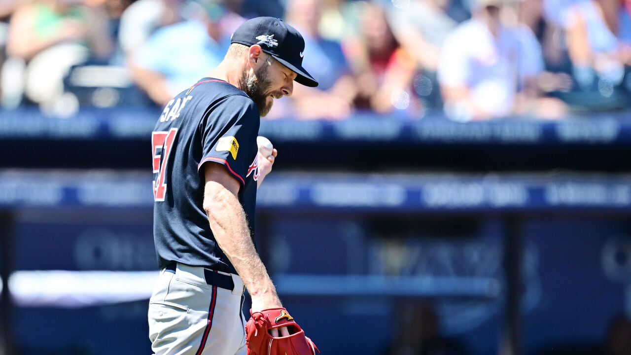 TAMPA, FLORIDA - APRIL 13: Chris Sale #51 of the Atlanta Braves reacts in the fifth inning against the Tampa Bay Rays at George M. Steinbrenner Field on April 13, 2025 in Tampa, Florida.