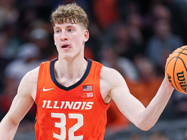 INDIANAPOLIS, INDIANA - MARCH 14: Kasparas Jakucionis #32 of the Illinois Fighting Illini passes the ball during the game against the Maryland Terrapins in the Big Ten men's basketball tournament quarterfinals at Gainbridge Fieldhouse on March 14, 2025 in Indianapolis, Indiana.