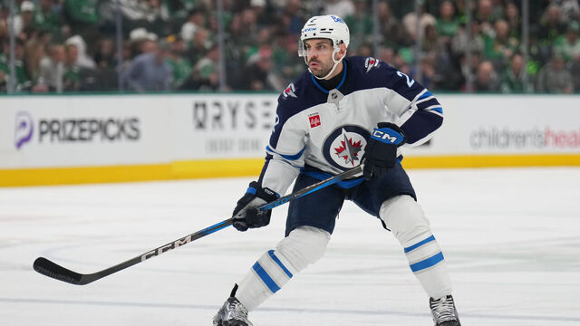 DALLAS, TX - APRIL 10: Dylan DeMelo # 2 of the Winnipeg Jets skates against the Dallas Stars at the American Airlines Center on April 10, 2025 in Dallas, Texas.