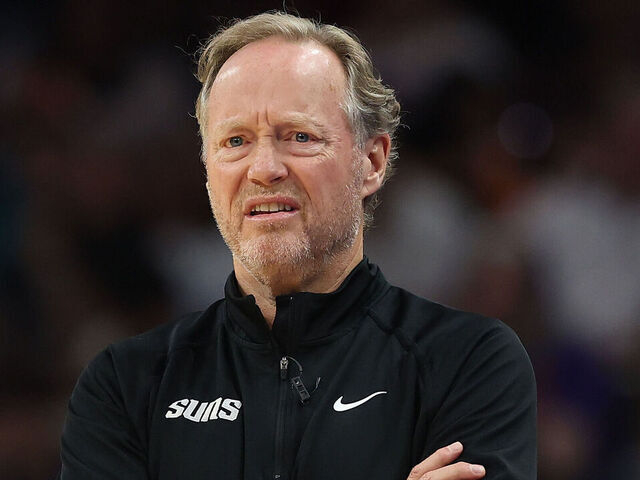 PHOENIX, ARIZONA - APRIL 08: Head coach Mike Budenholzer of the Phoenix Suns reacts during the first half of the NBA game at PHX Arena on April 08, 2025 in Phoenix, Arizona.