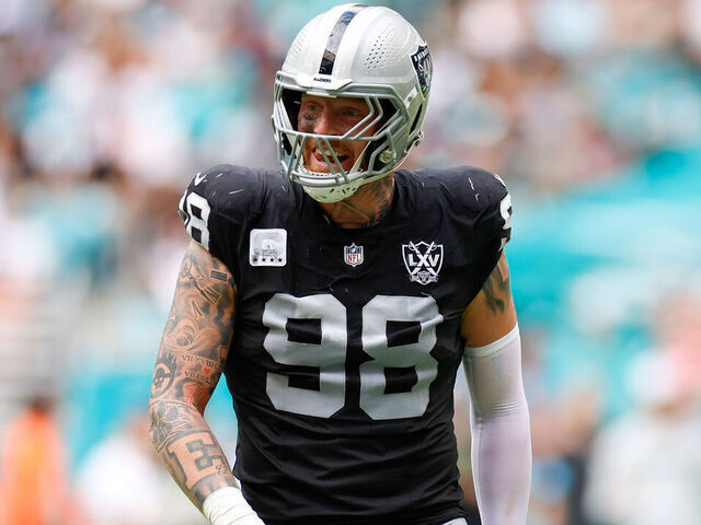 MIAMI GARDENS, FLORIDA - NOVEMBER 17: Maxx Crosby #98 of the Las Vegas Raiders celebrates during the first half against the Miami Dolphins at Hard Rock Stadium on November 17, 2024 in Miami Gardens, Florida.