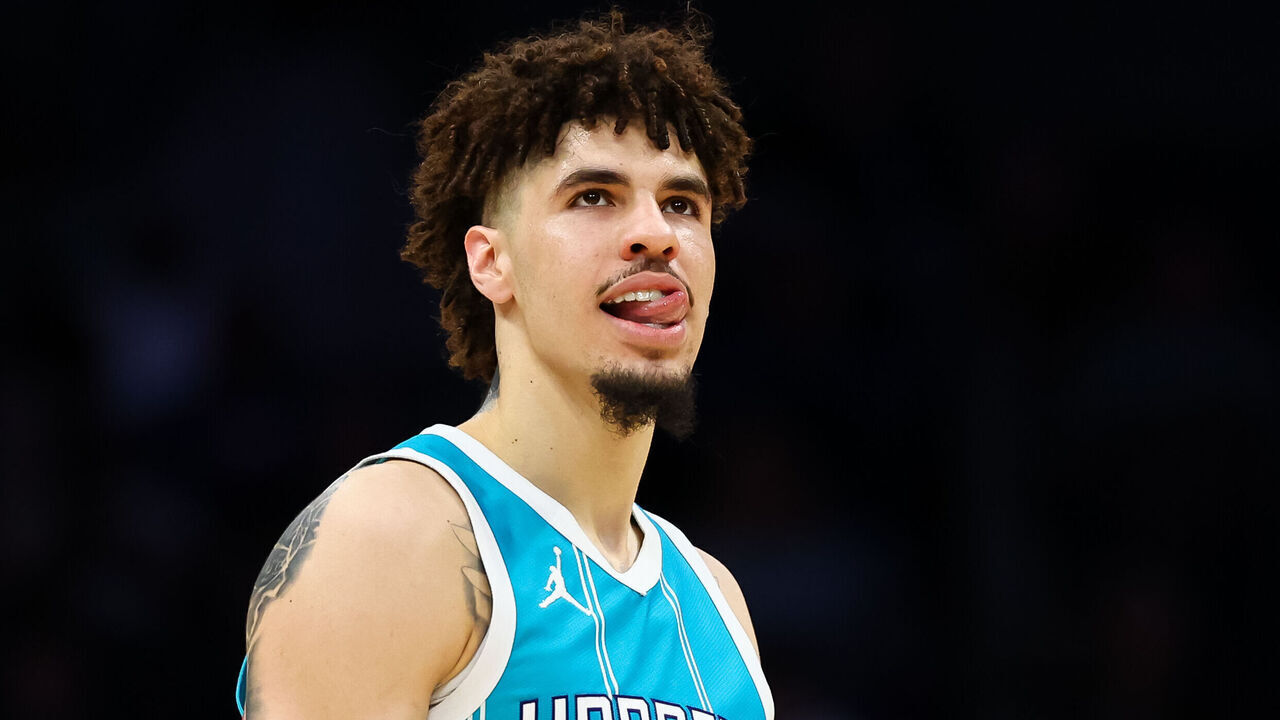CHARLOTTE, NORTH CAROLINA - MARCH 25: LaMelo Ball #1 of the Charlotte Hornets looks on during the second half of a basketball game against the Orlando Magic at Spectrum Center on March 25, 2025 in Charlotte, North Carolina.