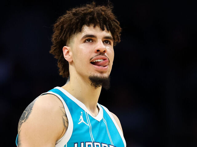 CHARLOTTE, NORTH CAROLINA - MARCH 25: LaMelo Ball #1 of the Charlotte Hornets looks on during the second half of a basketball game against the Orlando Magic at Spectrum Center on March 25, 2025 in Charlotte, North Carolina.