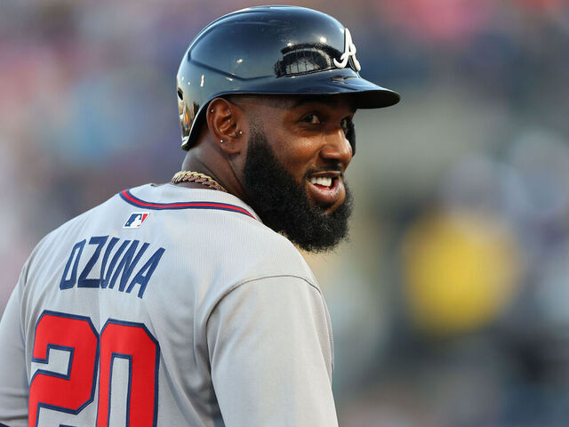 TAMPA, FL - APRIL 11: Marcell Ozuna #20 of the Atlanta Braves smiles on third base in the first inning during the game between the Atlanta Braves and the Tampa Bay Rays at George M. Steinbrenner Field on Friday, April 11, 2025 in Tampa, Florida.