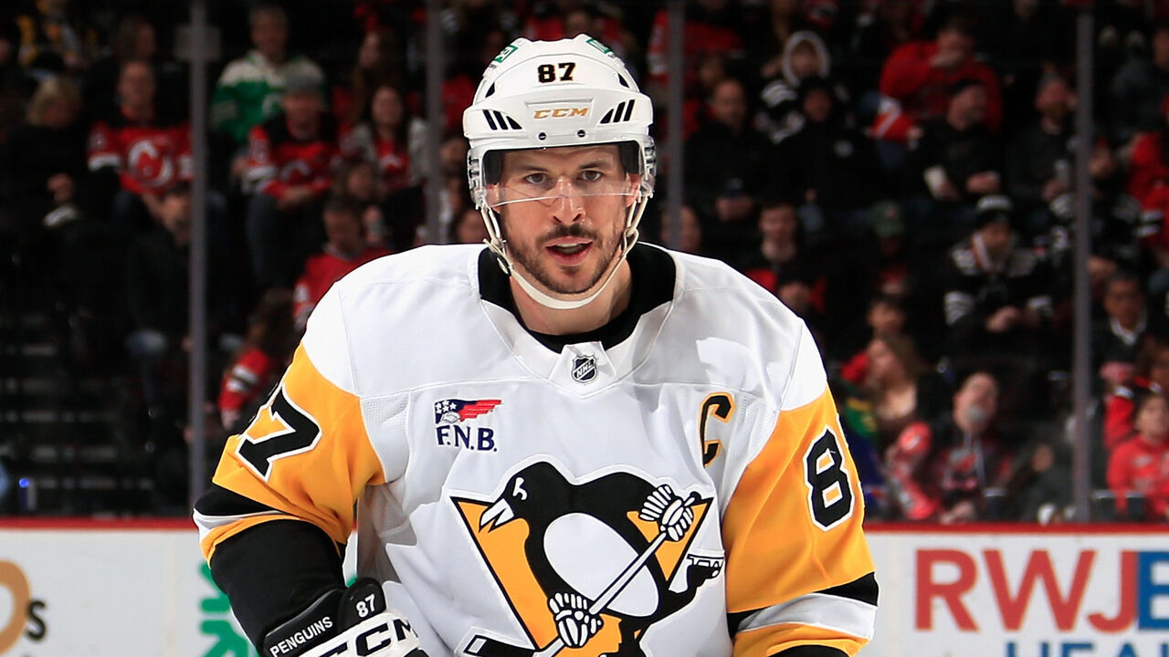 NEWARK, NEW JERSEY - APRIL 11: Sidney Crosby #87 of the Pittsburgh Penguins skates against the New Jersey Devils at Prudential Center on April 11, 2025 in Newark, New Jersey.