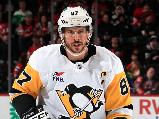 NEWARK, NEW JERSEY - APRIL 11: Sidney Crosby #87 of the Pittsburgh Penguins skates against the New Jersey Devils at Prudential Center on April 11, 2025 in Newark, New Jersey.