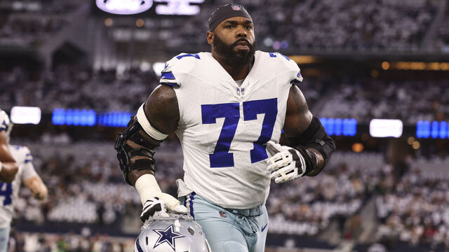 ARLINGTON, TX - JANUARY 14: Tyron Smith #77 of the Dallas Cowboys warms up prior to an NFL wild-card playoff football game against the Green Bay Packers at AT&T Stadium on January 14, 2024 in Arlington, Texas.
