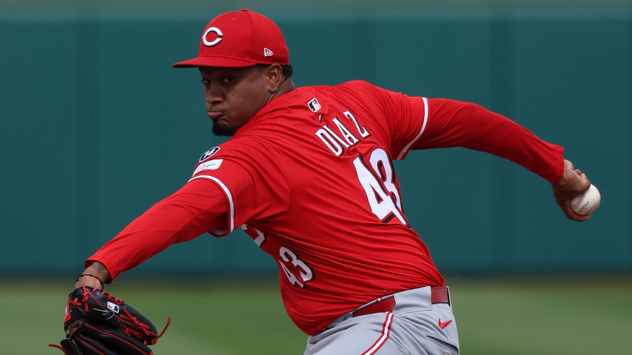 SURPRISE, ARIZONA - MARCH 12: Alexis Diaz #43 of the Cincinnati Reds pitches during the game against the Texas Rangers at Surprise Stadium on March 12, 2025 in Surprise, AZ.
