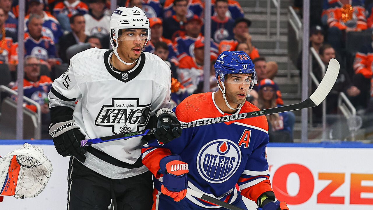 EDMONTON, AB - APRIL 24: Los Angeles Kings Winger Quinton Byfield (55) and Edmonton Oilers Defenceman Darnell Nurse (25) battle for position in the second period of game two of the Western Conference First Round Edmonton Oilers game versus the Los Angeles Kings on April 24, 2024 at Rogers Place in Edmonton, AB.