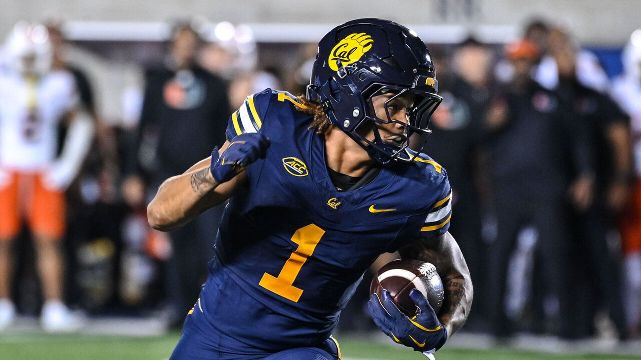 BERKELEY, CA - OCTOBER 05: California Golden Bears running back Jaydn Ott (1) scrambles to the right and gets into the end zone in the first half during the college football game between the California Golden Bears and the Miami Hurricanes on October 5, 2024, at California Memorial Stadium in Berkeley, CA.