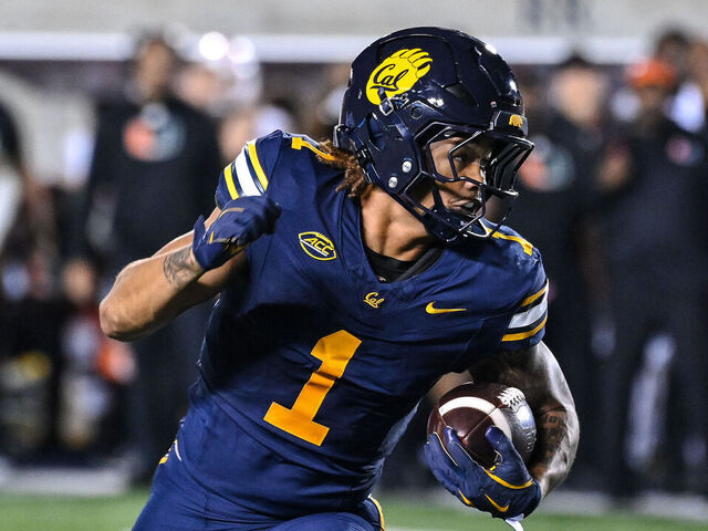 BERKELEY, CA - OCTOBER 05: California Golden Bears running back Jaydn Ott (1) scrambles to the right and gets into the end zone in the first half during the college football game between the California Golden Bears and the Miami Hurricanes on October 5, 2024, at California Memorial Stadium in Berkeley, CA.
