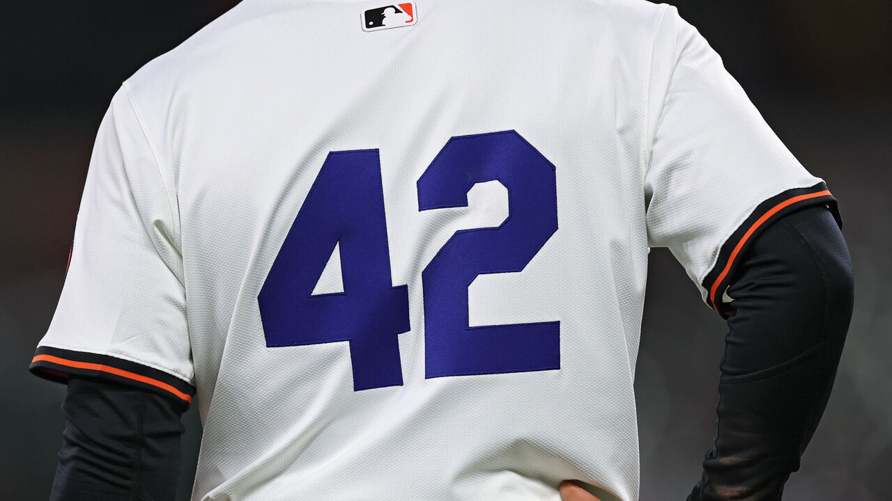 BALTIMORE, MARYLAND - APRIL 15: Cedric Mullins #31 of the Baltimore Orioles stands on third base against the Cleveland Guardians at Oriole Park at Camden Yards on April 15, 2025 in Baltimore, Maryland. All players are wearing the number 42 in honor of Jackie Robinson Day.