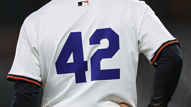 BALTIMORE, MARYLAND - APRIL 15: Cedric Mullins #31 of the Baltimore Orioles stands on third base against the Cleveland Guardians at Oriole Park at Camden Yards on April 15, 2025 in Baltimore, Maryland. All players are wearing the number 42 in honor of Jackie Robinson Day.