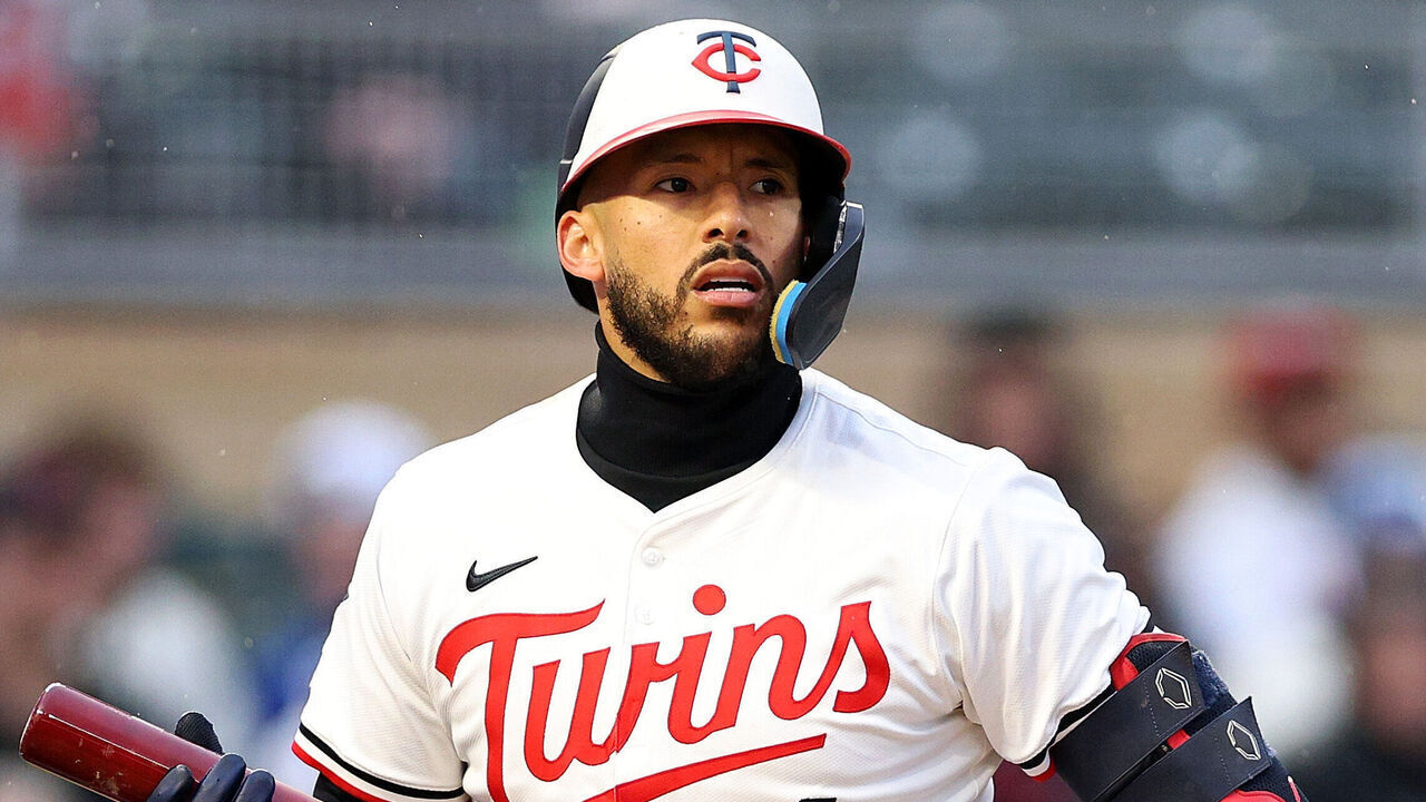 MINNEAPOLIS, MINNESOTA - APRIL 14: Carlos Correa #4 of the Minnesota Twins reacts to striking out against the New York Mets in the second inning at Target Field on April 14, 2025 in Minneapolis, Minnesota. The Mets defeated the Twins 5-1.