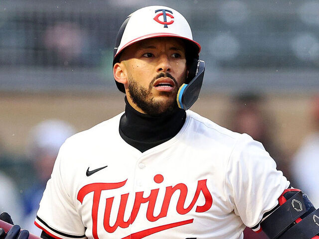 MINNEAPOLIS, MINNESOTA - APRIL 14: Carlos Correa #4 of the Minnesota Twins reacts to striking out against the New York Mets in the second inning at Target Field on April 14, 2025 in Minneapolis, Minnesota. The Mets defeated the Twins 5-1.