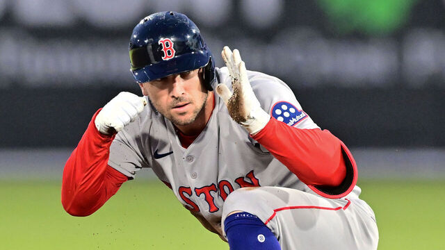 TAMPA, FLORIDA - APRIL 15: Alex Bregman #2 of the Boston Red Sox reacts after hitting an RBI double in the fourth inning against the Tampa Bay Rays at George M. Steinbrenner Field on April 15, 2025 in Tampa, Florida. All players are wearing the number 42 in honor of Jackie Robinson Day.