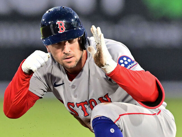 TAMPA, FLORIDA - APRIL 15: Alex Bregman #2 of the Boston Red Sox reacts after hitting an RBI double in the fourth inning against the Tampa Bay Rays at George M. Steinbrenner Field on April 15, 2025 in Tampa, Florida. All players are wearing the number 42 in honor of Jackie Robinson Day.