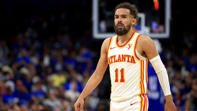 ORLANDO, FLORIDA - APRIL 15: Trae Young #11 of the Atlanta Hawks looks on during the second half of an NBA play-in tournament game against the Orlando Magic at Kia Center on April 15, 2025 in Orlando, Florida.
