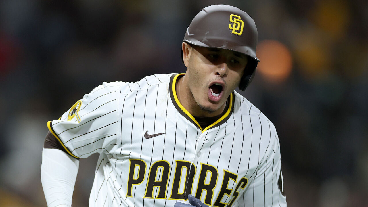 SAN DIEGO, CALIFORNIA - APRIL 15: Manny Machado #13 of the San Diego Padres reacts after hitting a solo homerun during the fifth inning of a game against the Chicago Cubs at Petco Park on April 15, 2025 in San Diego, California. All players are wearing the number 42 in honor of Jackie Robinson Day.