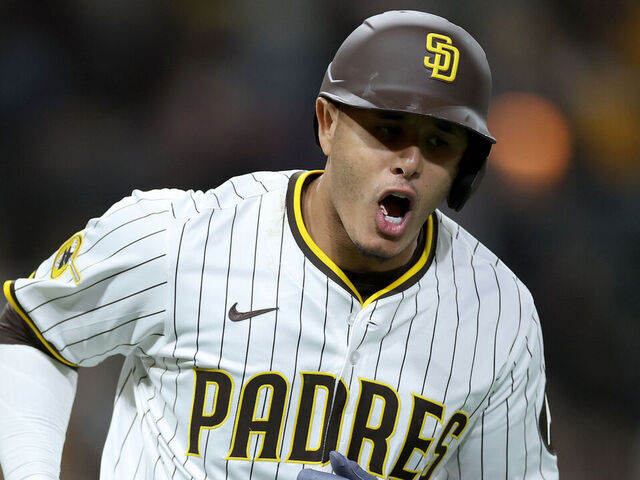 SAN DIEGO, CALIFORNIA - APRIL 15: Manny Machado #13 of the San Diego Padres reacts after hitting a solo homerun during the fifth inning of a game against the Chicago Cubs at Petco Park on April 15, 2025 in San Diego, California. All players are wearing the number 42 in honor of Jackie Robinson Day.