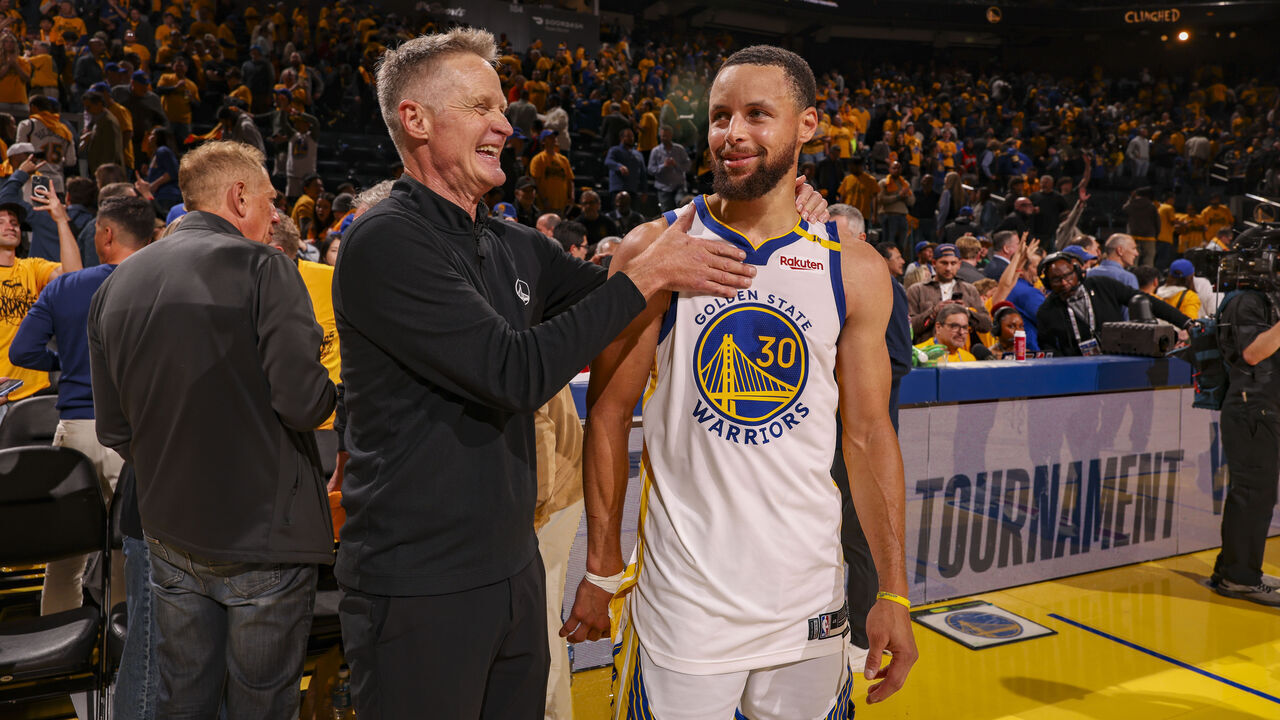 SAN FRANCISCO, CA - APRIL 1: Head Coach Steve Kerr of the Golden State Warriors celebrates with Stephen Curry #30 after the game against the Memphis Grizzlies in the 2025 SoFi Play-In Tournament on April 15, 2025 at Chase Center in San Francisco, California. NOTE TO USER: User expressly acknowledges and agrees that, by downloading and or using this photograph, user is consenting to the terms and conditions of Getty Images License Agreement. Mandatory Copyright Notice: Copyright 2025 NBAE
