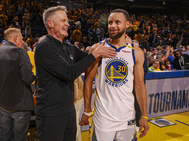 SAN FRANCISCO, CA - APRIL 1: Head Coach Steve Kerr of the Golden State Warriors celebrates with Stephen Curry #30 after the game against the Memphis Grizzlies in the 2025 SoFi Play-In Tournament on April 15, 2025 at Chase Center in San Francisco, California. NOTE TO USER: User expressly acknowledges and agrees that, by downloading and or using this photograph, user is consenting to the terms and conditions of Getty Images License Agreement. Mandatory Copyright Notice: Copyright 2025 NBAE