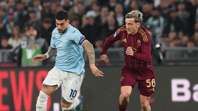 ROME, ITALY - APRIL 13: Mattia Zaccagni of SS Lazio fights for the ball with Alexis Saelemaekers of AS Roma during the Serie A match between SS Lazio and AS Roma at Stadio Olimpico on April 13, 2025 in Rome, Italy.