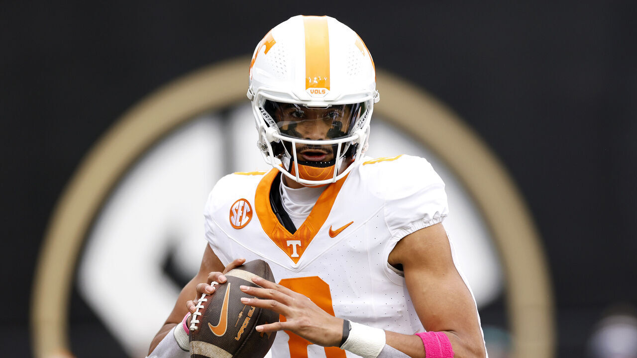 NASHVILLE, TENNESSEE - NOVEMBER 30: Nico Iamaleava #8 of the Tennessee Volunteers drops back to pass during the first half of the game between the Tennessee Volunteers and the Vanderbilt Commodores at FirstBank Stadium on November 30, 2024 in Nashville, Tennessee.